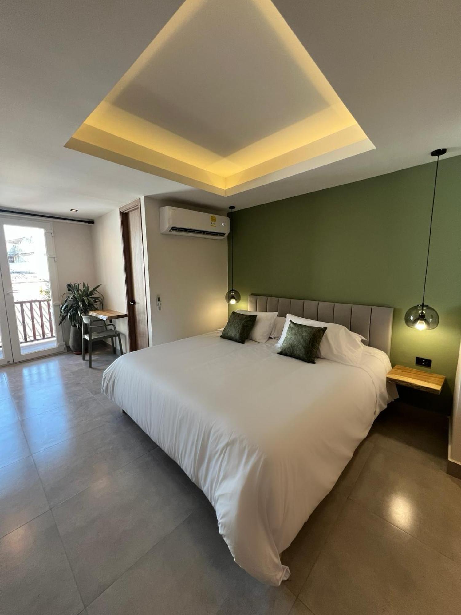 De La Cruz Apartahotel