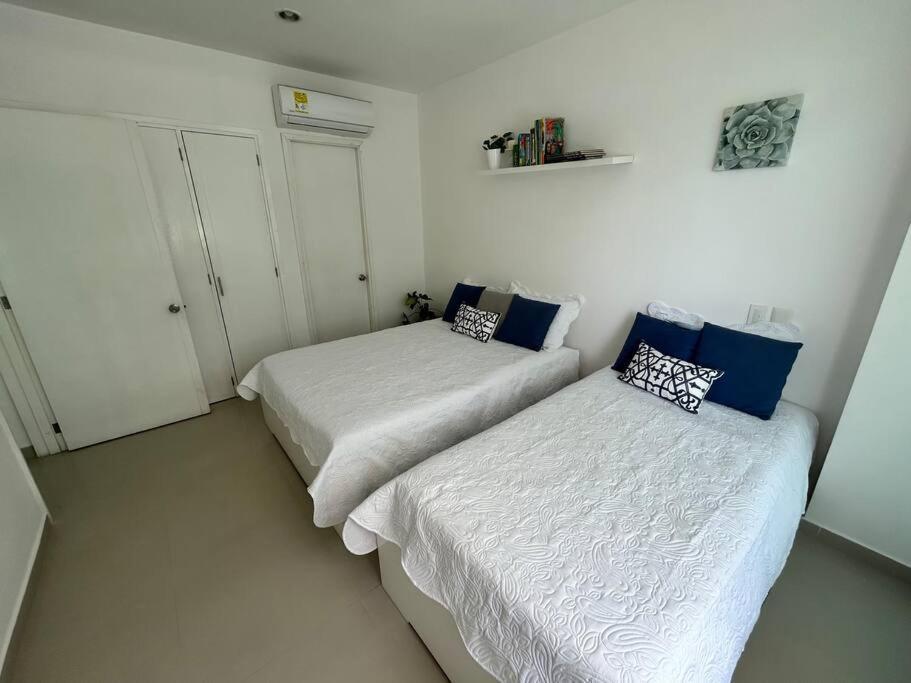 Beachfront Bliss-2br Haven Steps From Sandy Shores Apartment