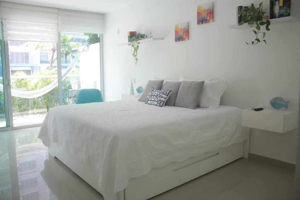 Apartment Beachfront Bliss-2br Haven Steps From Sandy Shores *