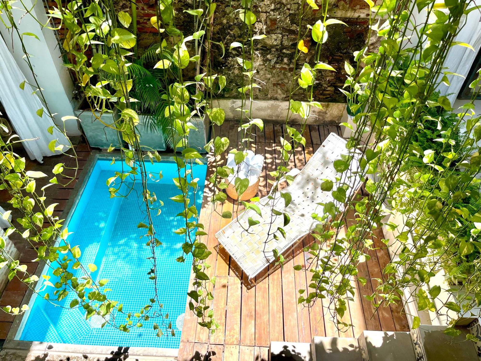 By Calamari Homes - Casa Aura Victoria Walled Cartagena